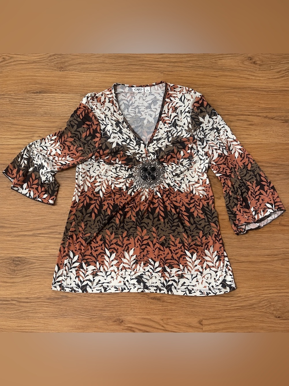 Leaf-Print V-Neck Tunic in Rust, Brown & White with Decorative Medallion